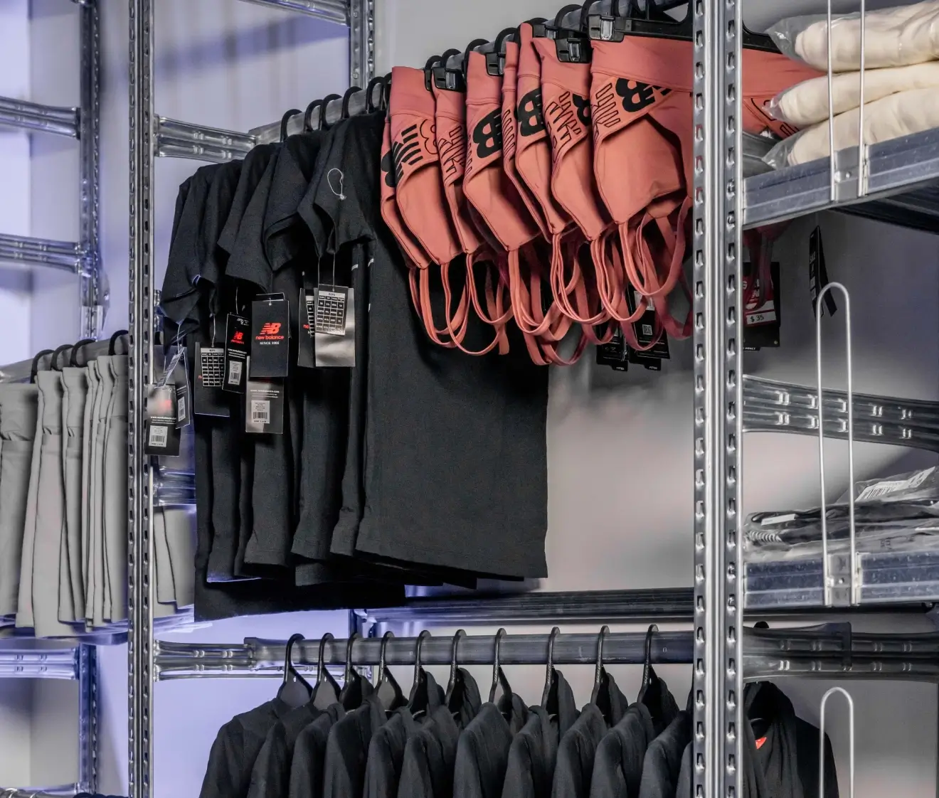 Retail hanging apparel racking system for organised garment storage and display